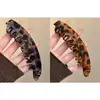 Grampo de Cabelo Estampa de Leopardo para Mulheres Verão 2025 Novo Presilha Vertical para Cabelo para Rabo de Cavalo Alto Presilha Banana Acessório de Cabelo na Parte de Trás da Cabeça