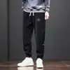 Pantalones casuales engrosados para hombre, nuevos pantalones deportivos tipo jogger de pana cálida para hombre con retazos, modernos y versátiles