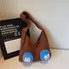 Bolso de Lana de Monstruo de Boca Grande Tejido para Mujer 2025 Nuevo El Más Fácil de Combinar Bolso de Hombro de Gran Capacidad Estilo Perezoso Bolso Relleno