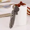 Estrella de la moda europea y americana punk venta caliente nuevo personalizado toma callejera retro cuero genuino collar de pluma grande collar de piel de vaca
