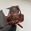 Bolsa de Bowling de Nicho Sin Cierre en Festival de Primavera para Mujer 2025 Nueva Bolsa Cuadrada Pequeña de Mano Retro Bolso de Hombro Cruzado