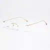 Gafas Graduadas Sin Montura de Titanio Puro Ultraligeras para Hombres y Mujeres, Gafas Profesionales con Graduaciones Personalizables, Elegante Montura Dorada, Bloqueo de Luz Azul