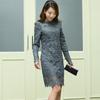 Vestido elegante de encaje adelgazante de estilo coreano nuevo de primavera y verano con leche de papaya, falda base de cuello redondo y manga larga hueca a la moda
