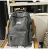 Mochila Nueva Casual Transfronteriza de Gran Capacidad Ligera, Mismo Estilo Outdoor Impermeable de Nylon para Estudiantes Hombres y Mujeres