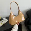 Bolsa de charol de nicho 2023 Bolso baguette de media luna para mujer Bolso de hombro para mujer Bolso de mano para mujer Bolso de axila de moda texturizado