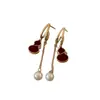 Aretes de borla de perla de calabaza burdeos para mujer, nuevo estilo chino, lujo ligero, gama alta, elegantes, de nicho, versátiles