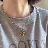 Primavera e Verão Novo Estilo Empilhado Colorido Pequeno Pingente de Flor Corrente para Clavícula Feminina Bonita Colar Acessórios