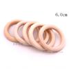 Fabricante al por mayor de anillos de madera de color madera de loto de 12 a 150 mm, anillos colgantes, bolsos, cortinas y anillos de madera.