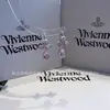 Pendientes Saturno Estilo Western de Alta Gama Serie Ismene Planeta Completo en Diamante Clásico Pendientes Estrella Lágrima de Sirena