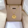 [Cuerpo entero de acero de titanio] Collar de oro real de estilo minimalista con cerradura Xiangyun con personaje Fu en horno para mujer, accesorios de cadena de clavícula de celebridades de Internet