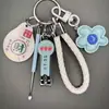 Chaveiro Flor Colorida Dopamina Pingente de Bolsa Girly Coração Acessório Cortador de Unha Palito de Ouvido Conjunto de Chaveiros