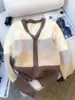 Otoño e Invierno Nuevo Estilo Bloques de Color Degradado Botones Pulóver Moda Versátil Longitud Media Cárdigan Suéter Chaqueta de Punto Corte Holgado