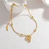 Joias de aço titânio Dongguan não desbotam moda de nicho versátil simples corrente osso de cobra pulseira coração amor aço inoxidável para mulheres
