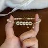 [Riqueza de Todas las Direcciones] Nuevo diseño de nicho pulsera de monedas con diamantes brillantes, una pulsera retro versátil y elegante inspirada en China para mujeres