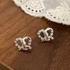 Diseño Personalizado de Nicho Sentido Irregular Zirconia Incrustada Corazón Pendientes de Botón Elegante Lujo Ligero Gama Alta Moda Versátil Accesorios para Pendientes