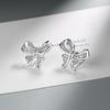 Pendientes elegantes con lazo y diamantes para mujer, sencillos, estilo europeo y americano, con bordes cruzados, de cobre, estilo europeo y americano.