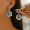 Brincos Cruzados de Exportação Novo Estilo Retrô Étnico Boêmio Liga de Metal Incrustada Turquesa Flor de Abóbora Pendente para Mulheres