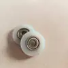 Accesorios para máquina Yuanbao rueda de goma pequeña, polea con eje recubierto de goma, rodillo guía de goma, duradero