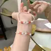 Pulseira tecida DIY feita à mão em estilo chinês original com cristal rosa natural, jade Hetian e ágata, apresentando um design fofo de desenho animado