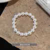 Pulseira multicamadas de diamante e pérola estilo francês, novo modelo popular de 2026, design único, pulseira dupla camada requintada e de luxo leve