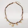 N12841 Exportación Elegante Retro Estampado de Leopardo Aleación Colgante Collar Geométrico Sol Corazón Multi-Elemento Cadena para Clavícula