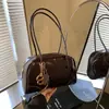 Miu Bolso retro Maillard para mujer 2026 nuevo estilo bolso de mano de celebridad de internet bolso de boliche bolso versátil de un solo hombro