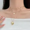 Collar Multicapa con Colgante de Corazón Dorado Estilo Medieval para Mujer Diseño de Nicho Cadena para Clavícula de Perlas de Moda