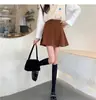 Nueva falda de pana de cintura alta, adelgazante, para mujer, colección primavera/otoño 2026, elegante falda corta de línea A con diseño anti-exposición
