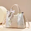 Bolsa transversal popular feminina transfronteiriça, novo modelo 2026 Bolsa de Brocado Yunhe Song, presente de feriado, nova bolsa de mão estilo chinês
