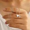 Europa y Estados Unidos joyería transfronteriza 26 letras plata colgante de corazón collar de moda exquisito Joker collar para mujer venta al por mayor
