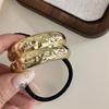 Anillo elástico para el cabello cóncavo-convexo de metal con personalidad y diseño de nicho, cuerda para el cabello geométrica de viento frío que combina con todo, cuerda para la cabeza con temperamento retro