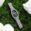 Venta Caliente Dama Elegante Incrustaciones de Pedrería Oval Pequeño Moderno Acero Inoxidable Banda Banda Ligero Lujo Reloj Femenino Comercio Exterior Transmisión en Vivo Mercancía