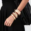 Pulseras Europeas y Americanas Transfronterizas, Lujo Ligero y Gama Alta para Mujer, Diseño de Aleación Brillante Electroplateada, Manos Onduladas Geométricas Plegadas