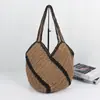 Bolso de hombro retro transfronterizo de paja, nuevo bolso de mano geométrico de bloques de color, bolsa tejida de gran capacidad para vacaciones junto al mar y viajes a la playa