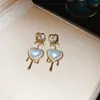 Pendientes de Borla con Forma de Flor de Abanico Incrustados con Circonita de Diamante Transfronterizos Europeos y Americanos, Lujo Ligero, Pendientes de Gama Alta, Diseño de Nicho