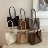 Moda Verano 2026 Bolso de Mano de Color Sólido de un Solo Hombro Diseño de Nicho Simple y Elegante para Mujer Bolso Casual para Debajo del Brazo