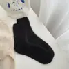Calcetines de felpa cálidos suaves y dulces para niña calcetines de otoño e invierno para mujer con más terciopelo calcetines de rayas de tubo medio para niña calcetines para dormir a prueba de frío
