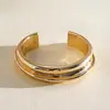 Pulsera abierta de metal con textura brillante transfronteriza europea y americana, estilo coreano ins de lujo ligero de alta gama, joyería versátil al por mayor