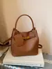 Bolso Retro de Nicho para Mujer 2026 Nuevo de Moda Casual Versátil Bolso Cubo para Viajar Simple Cruzado Bolso Madre-Hija