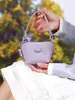 Bolso de mano de diseño exclusivo para mujer, de alta calidad, elegante y perfecto para guardar monedas y auriculares.; un tarjetero mini y portátil y una bolsa pequeña para el día a día