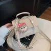 Moda Transfronteriza Moda Retro Británica Bolso Cuadrado Pequeño para Mujer 2026 Nuevo Bolso de Mano de Moda Popular Bolso de Hombro Cruzado