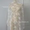 Tecido de renda borboleta mais vendido do fabricante, material de renda não elástico de náilon-algodão, disponível em preto, branco e damasco, adequado para fazer vestidos.
