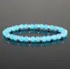Venta transfronteriza Pulsera de aleación de turquesa de piedra volcánica estilo europeo y americano moda color sólido pulsera de cuentas de vidrio joyería para mujer al por mayor