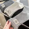Calcetines de otoño e invierno a media pantorrilla con etiqueta de tela a rayas con volantes para mujer, calcetines apilados retro coreanos, calcetines de algodón para mujer, venta al por mayor para tiendas de Instagram
