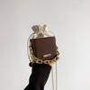 Bolso de hombro con cadena de moda y tendencia para mujer, bolso de diario con cordón, bolso tipo cubo con diseño de nicho, bolso de mensajero de color