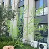 Plantas verdes artificiales serie GYYDB, ideales para escaparates de bodas y fines decorativos; hojas verdes artificiales al por mayor