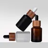 Frasco Conta-Gotas de Vidro Personalizado de Alta Qualidade com Tampa de Madeira de Bambu, Cor de Chá, Ombro Inclinado, 30ml, Frasco Vazio para Óleo Essencial de Skincare e Cuidados com os Cabelos, OEM