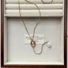 Acero de Titanio No se Desvanece Collar Largo para Mujer Cadena de Perlas Retro Otoño e Invierno Cadena de Suéter Accesorios de Lujo Accesible de Nicho Elegantes