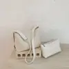 Bolso de Hombro Cruzado para Mujer con Textura Tejida Estilo Francés de Nicho Verano 2026 Temperamento Elegante para el Trabajo