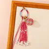 Nuevo Bolso Colgante de Bola de la Suerte Tejido a Mano Bolso Colgante Encanto Tendencia Nacional Nicho Borla Llavero de Pareja Colgante Venta al por Mayor
